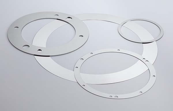 Sheet metal turning - examples of shims and shim rings from peel-plate in different sizes